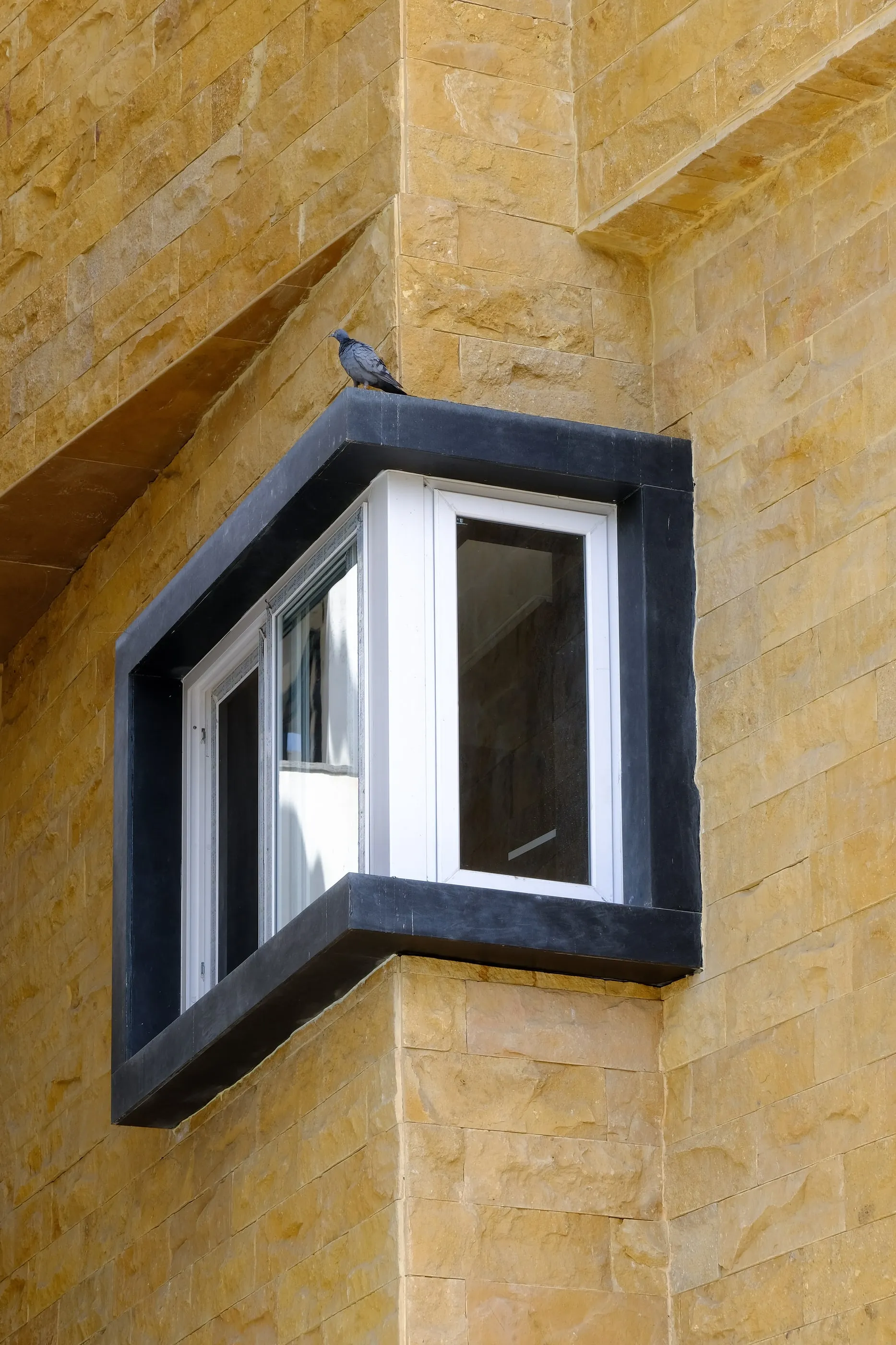 The angled kitchen corner window