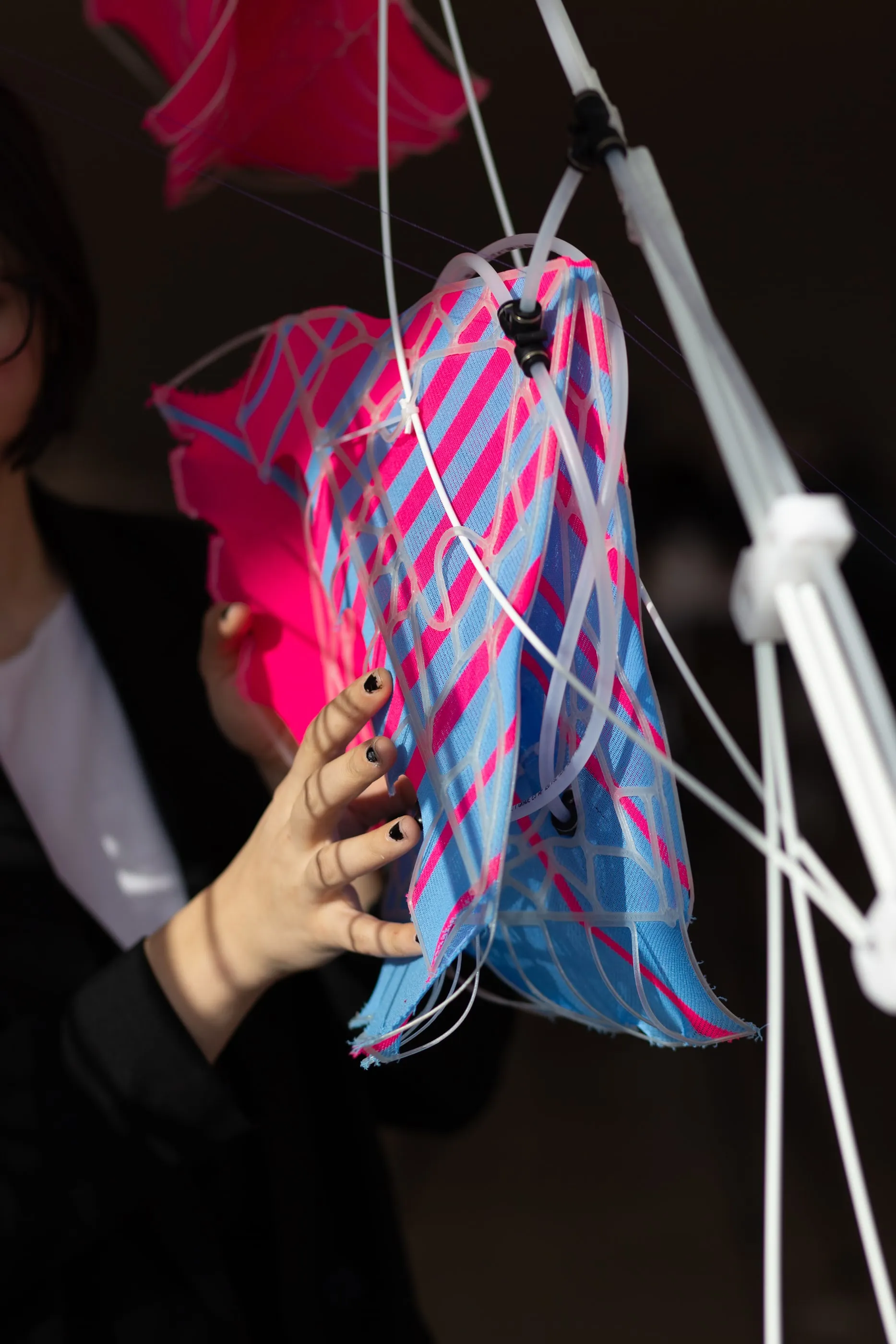 A hand reaching into an inflated module
